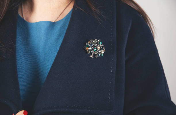 istock woman coat brooch 1303906966