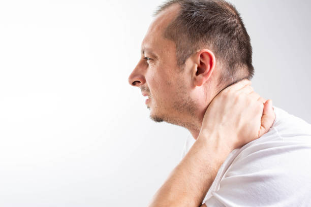 istock Man suffering from neck pain. Headache pain. 1303908201