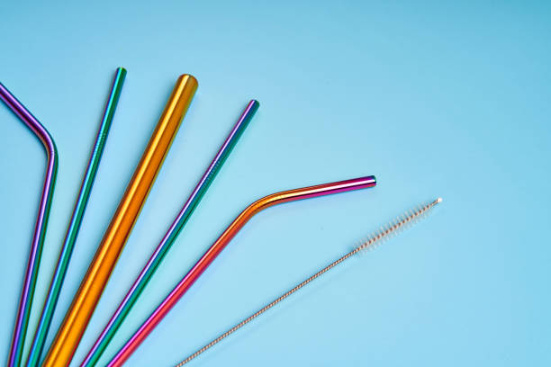 istock The modern trend in environmental care. Reusable metal straws for drinks. Replacement with common plastic beverage straws 1303908714