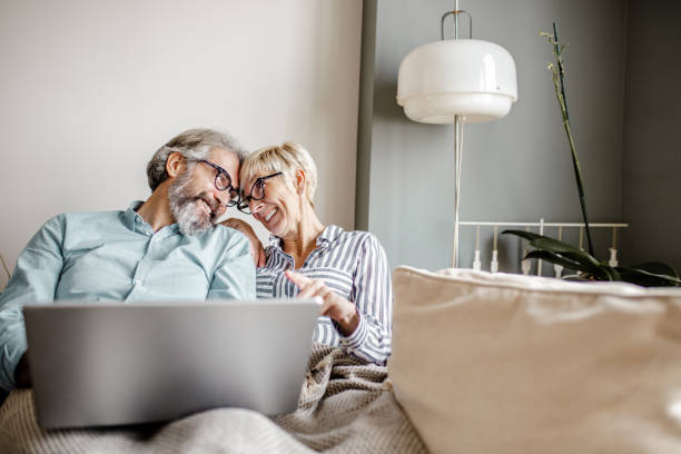 istock Seniors are using laptop at home 1303909866