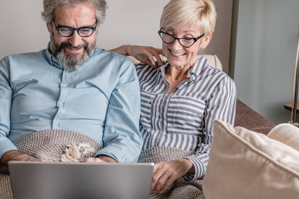 istock Seniors are using laptop at home 1303909968