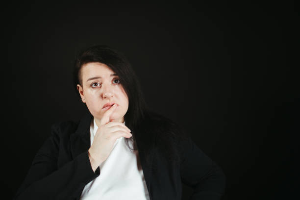 Doubtful pensive woman. Sale, decision, special offer, solution search. Background with copy space for advertising