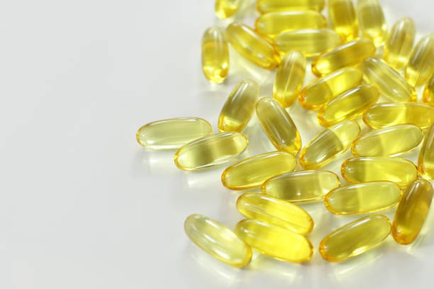 istock Yellow medicine capsule 1303911293