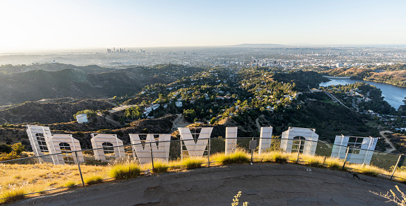 Los Angeles, California, USA - October 21, 2019:  Early morning panorama cityscape view from the back of the Hollywood Sign in popular Griffith Park.
