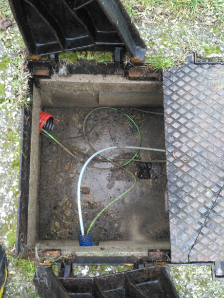 istock fiber optic manhole cover 1303915195
