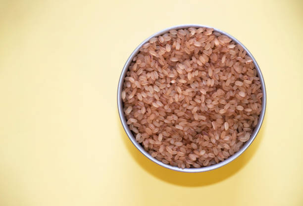 Kerala Special Matta Rice In Yellow Background. Selective Focus