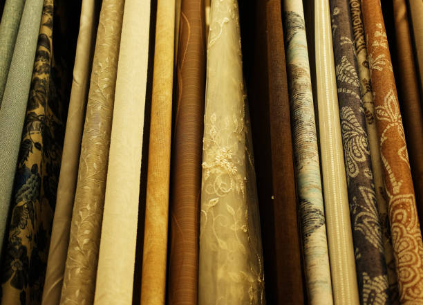 istock Rolls of fabric and textiles in store 1303916322
