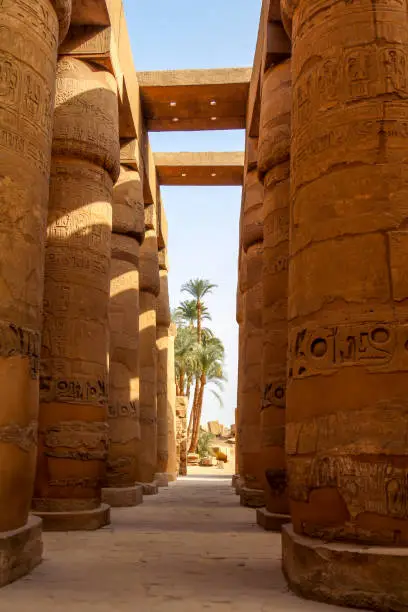 Photo of View through the majestic columns of Karnak temple through a gate