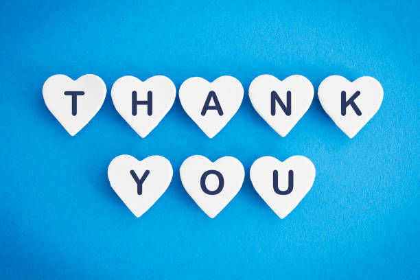 istock Thank you on blue background 1303920881