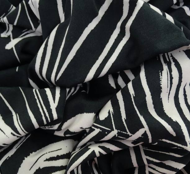 istock Abstract composition in black and white color on fabric 1303927586