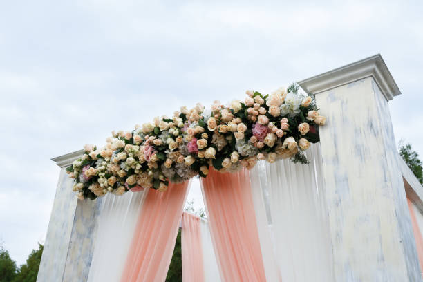 istock Wedding ceremony decor in white colors 1303929778