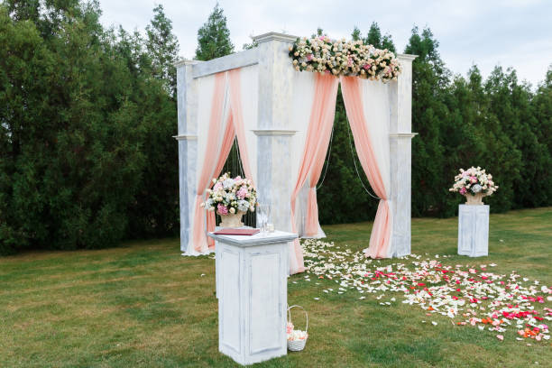 istock Wedding ceremony decor in white colors 1303929799