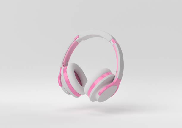 istock pink-white headphone floating on white background. minimal concept idea. 3d render. 1303938803