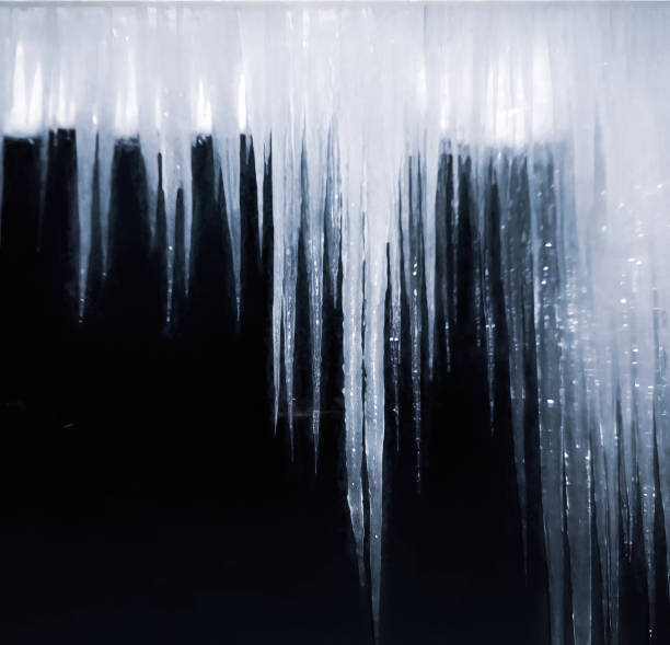 istock Icicles hanging from porch at night 1303938843