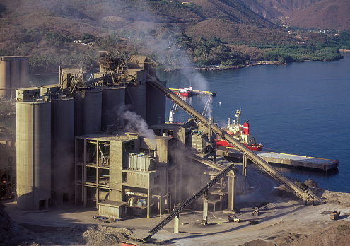 Cement factory with ship loading at seaport, Venezuela