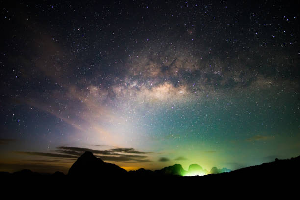 istock Landscape night dark sky. Milky way and star over mountain 1303948733