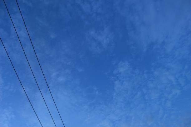 istock blue sky and bright and beautiful clouds 1303951650