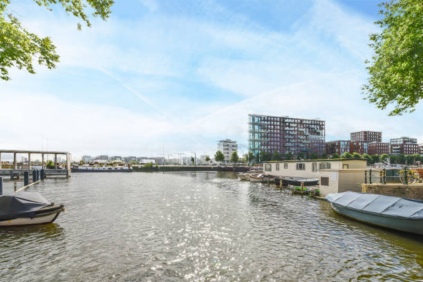 istock Residential area by the river 1303961317