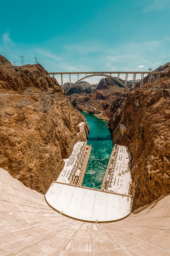 The Hoover Dam in the Black Canyon of the Colorado River on the border between Nevada and Arizona, USA, seen a hot summer day.