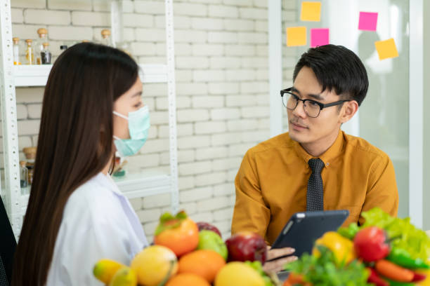 istock Patient meet nutritionist. 1303964069