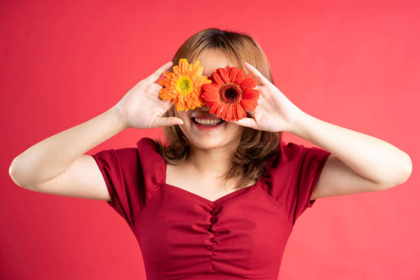 istock Girl holding bouquet 1303965567