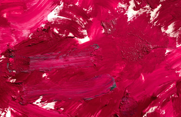 istock Chaotic paint strokes. Stained burgundy red  color painted wall surface 1303971599