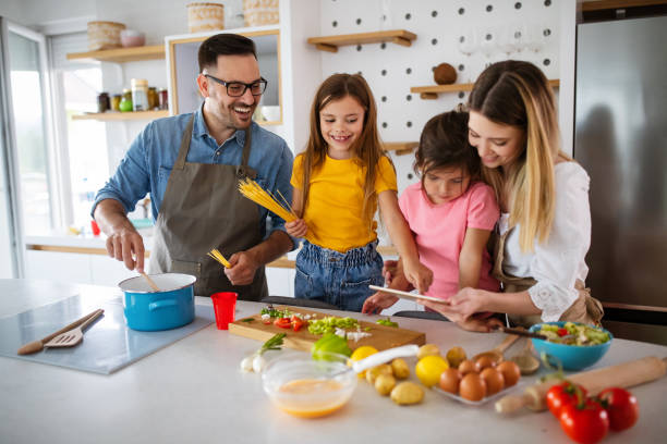 istock Happy family having fun time at home 1303976675