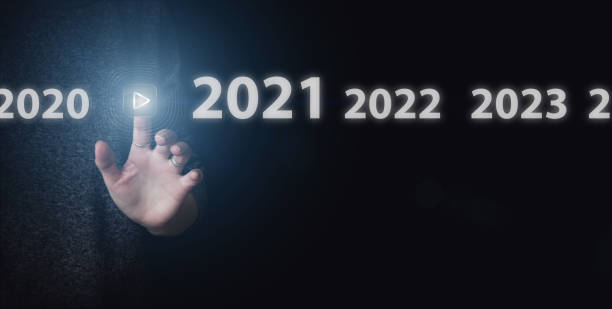 istock Hand presses virtual inclusion button on dark background. Concept of 2021 year. 1303979050