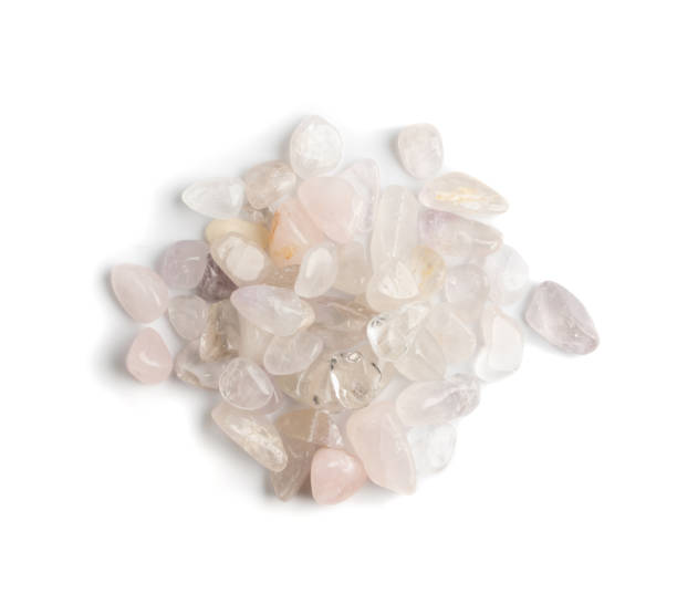 istock Rose quartz pebbles isolated, pink quartz polished stones 1303979216