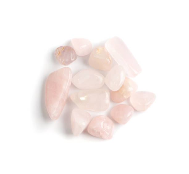 istock Rose quartz pebbles isolated, pink quartz polished stones 1303979222