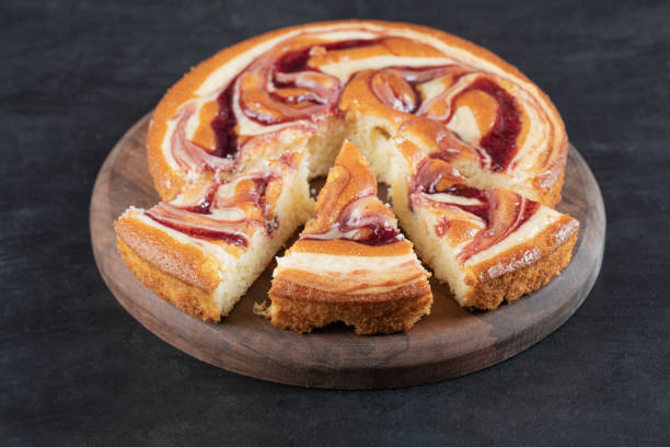 istock Soft yummy pie with mixed ingredients on a wooden board 1303979812