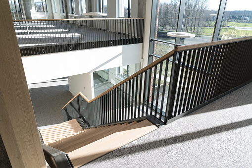 In the middle of an open office, this beautiful staircase connects the 1st and 2nd floor