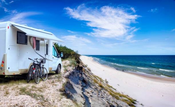 istock Vacations in Poland - motorhome at Baltic seashore in Mrzezyno 1303981849