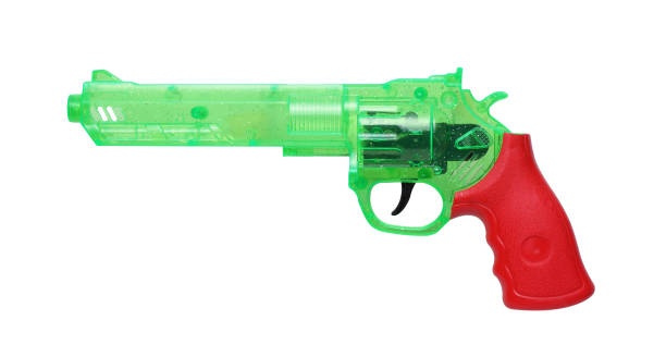 istock plastic gun for kid isolated on white background 1303982683