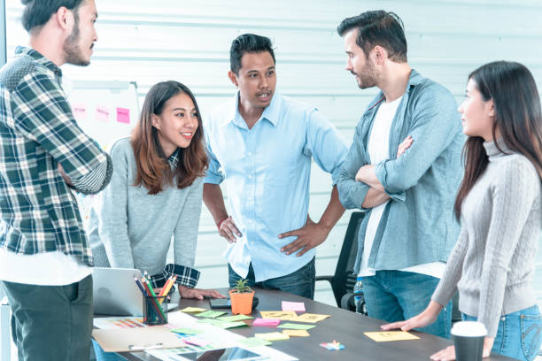istock Multi Ethnics Teamwork Collaboration Team Meeting Communication concept in Business people Working Together Conference Room. Diversity Partner Business Meeting brainstorming together Businessman Team 1303987435