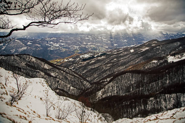 Pasture in front of snow covered Corno Grande in Gran Sasso National Park