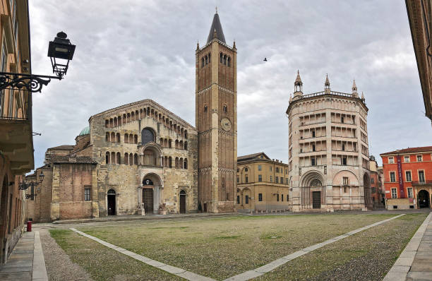 istock Parma Cathedral Baptistery in empty dome square, Emilia Romagna Italy 1303991699