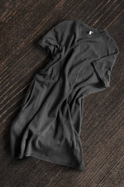 istock Dress on wooden background 1303991756
