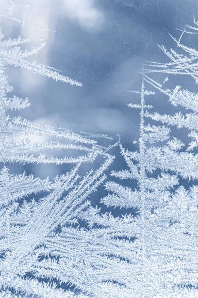 istock Winter ice frozen window glass texture cold 1303993395