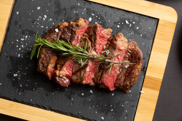 istock Grilled Argentine beef chorizo bife top view. 1303994487