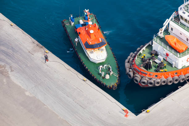 istock Pilot boat and a tug, Saudi Arabia port 1303994771
