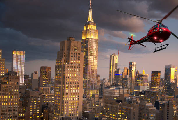 istock Helicopter tour over Manhattan at night . 1303995558