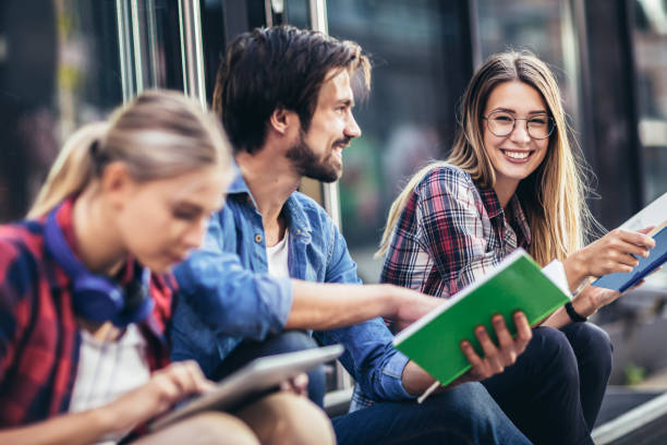 istock Group of happy students outdoor 1303995818