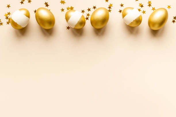 istock Golden Easter eggs with decoration. Wealth and good luck concept. 1303995978