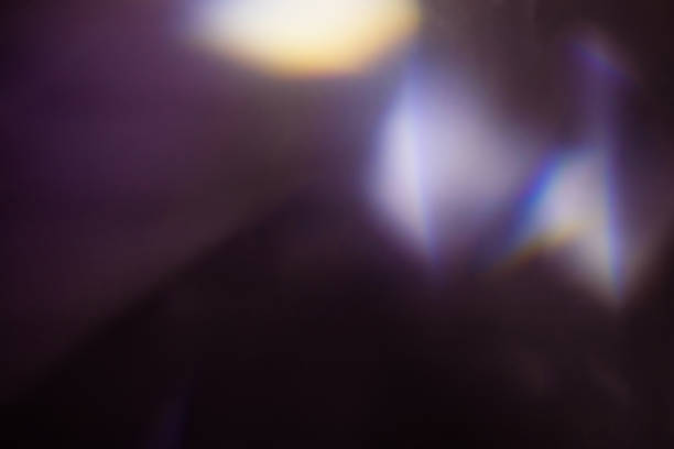 istock colorful warm rainbow light leaks on black background with dust texture 1303996711