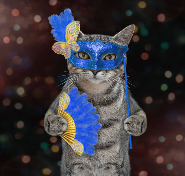 istock Cat gray in blue carnival mask 2 1303999316