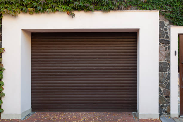 istock Roller gates to courtyard on summer day 1304000113