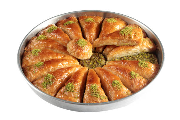 istock Traditional Turkish dessert Baklava with pistachios on a tray 1304001784