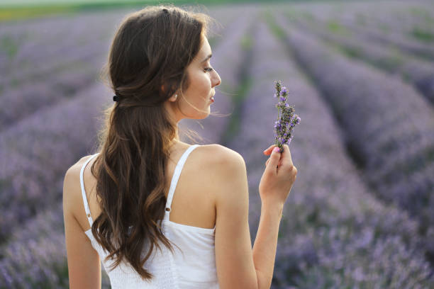 istock Young girl in lavender field 1304003630