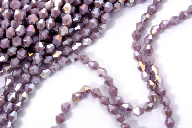 istock Beautiful Light purple Glass Sparkle Crystal Isoalted Beads on white background. Use for diy 1304005141